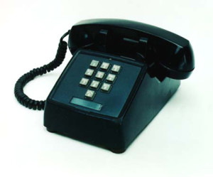 A push-button TouchTone phone from 1963. Note the * and # keys are not included, as they were not introduced until 1968.